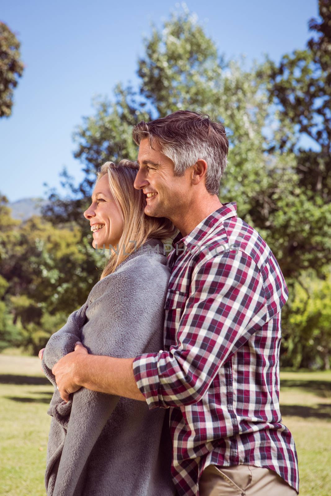 Happy couple in the park on a sunny day