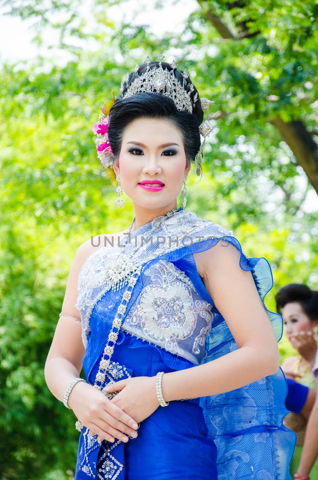 LOPBURI - APRIL 13: Unidentified model in period dress on Songkran Festival is celebrated in Thailand as the traditional New Year's at Banmi district on April 13, 2015 in Lopburi, Thailand
