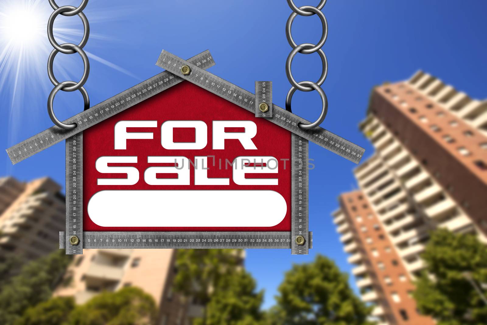 Grey metallic meter ruler in the shape of house with text for sale. For sale real estate sign with tall and blurred buildings in the background