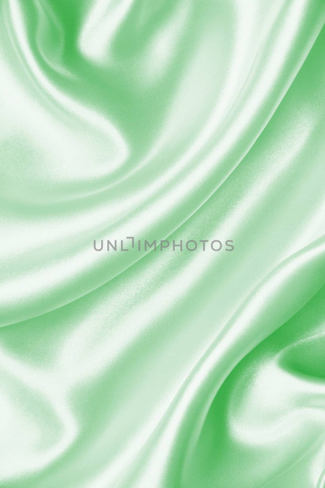 Smooth elegant green silk or satin as background  by oxanatravel