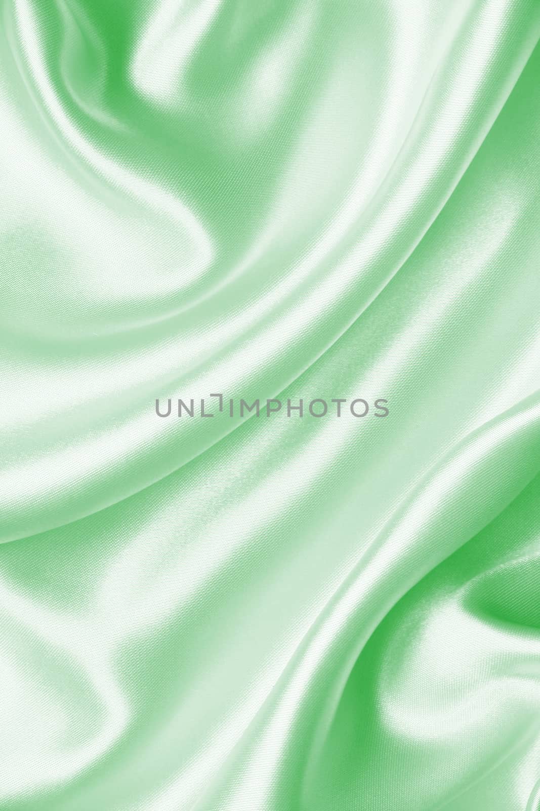 Smooth elegant green silk or satin can use as background 