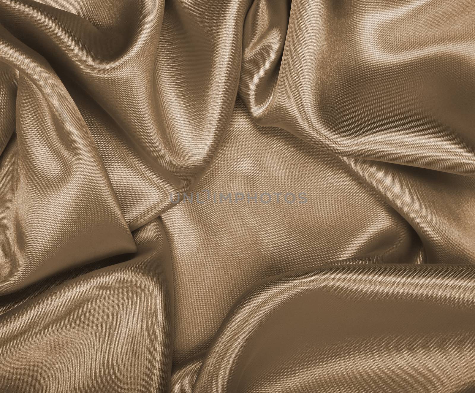 Smooth elegant golden silk or satin as wedding background. In Se by oxanatravel