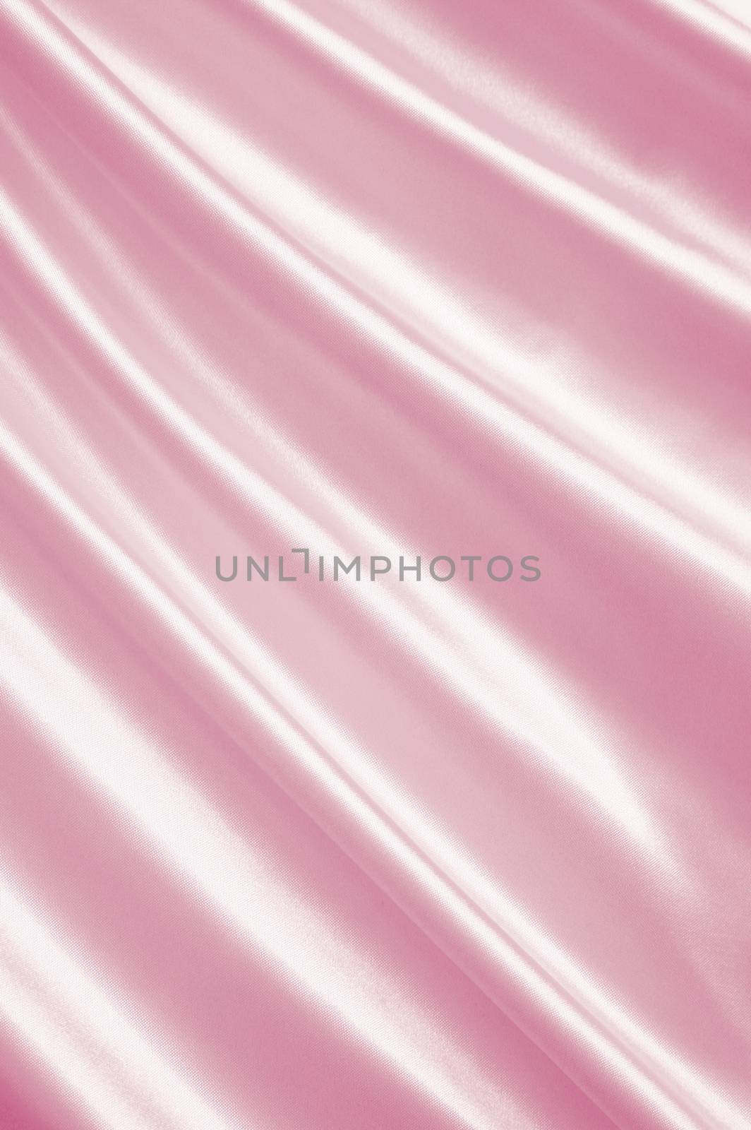 Smooth elegant pink silk or satin as wedding background by oxanatravel