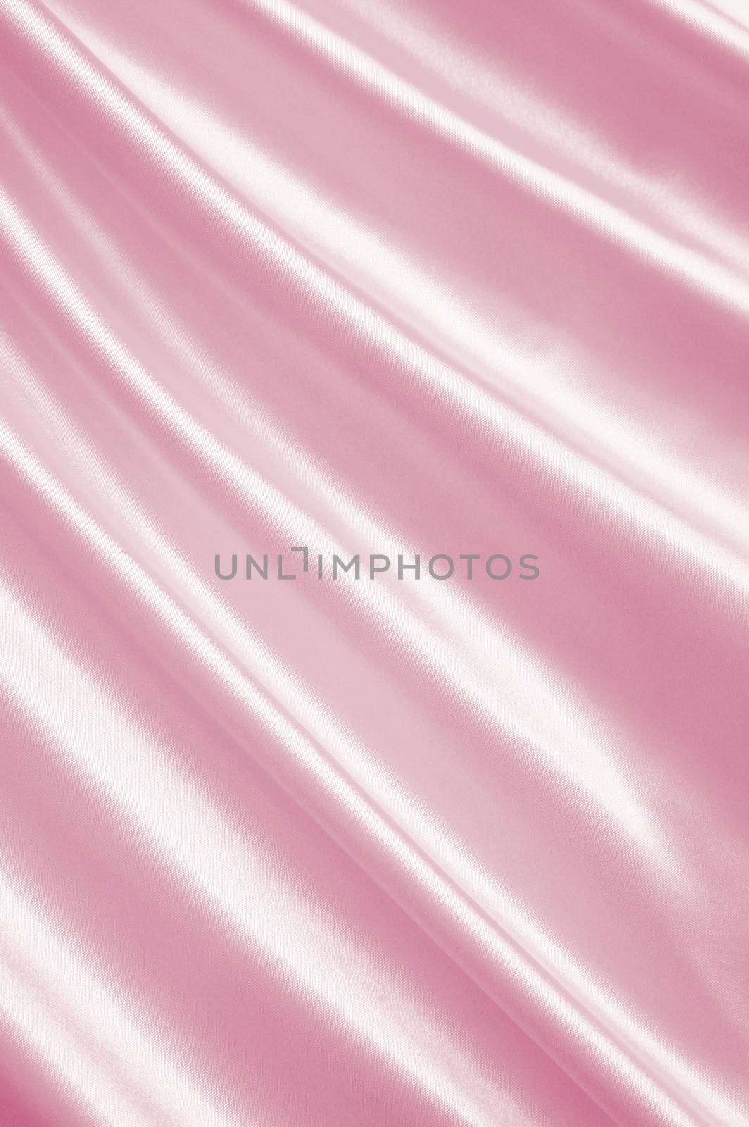 Smooth elegant pink silk or satin can use as wedding background