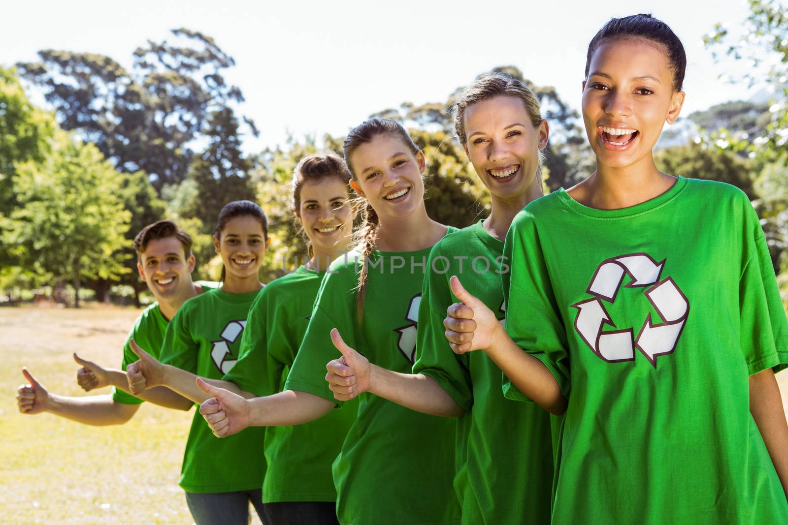 Environmental activists smiling at camera by Wavebreakmedia