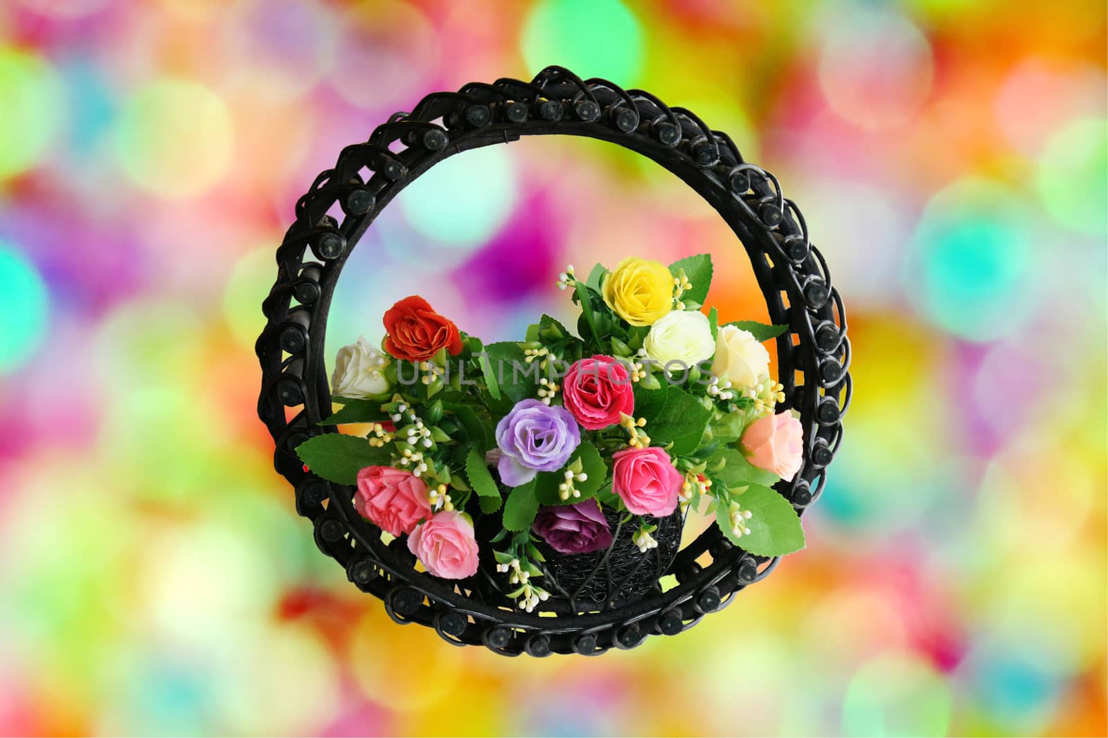 Rose basket on colorful background by mranucha