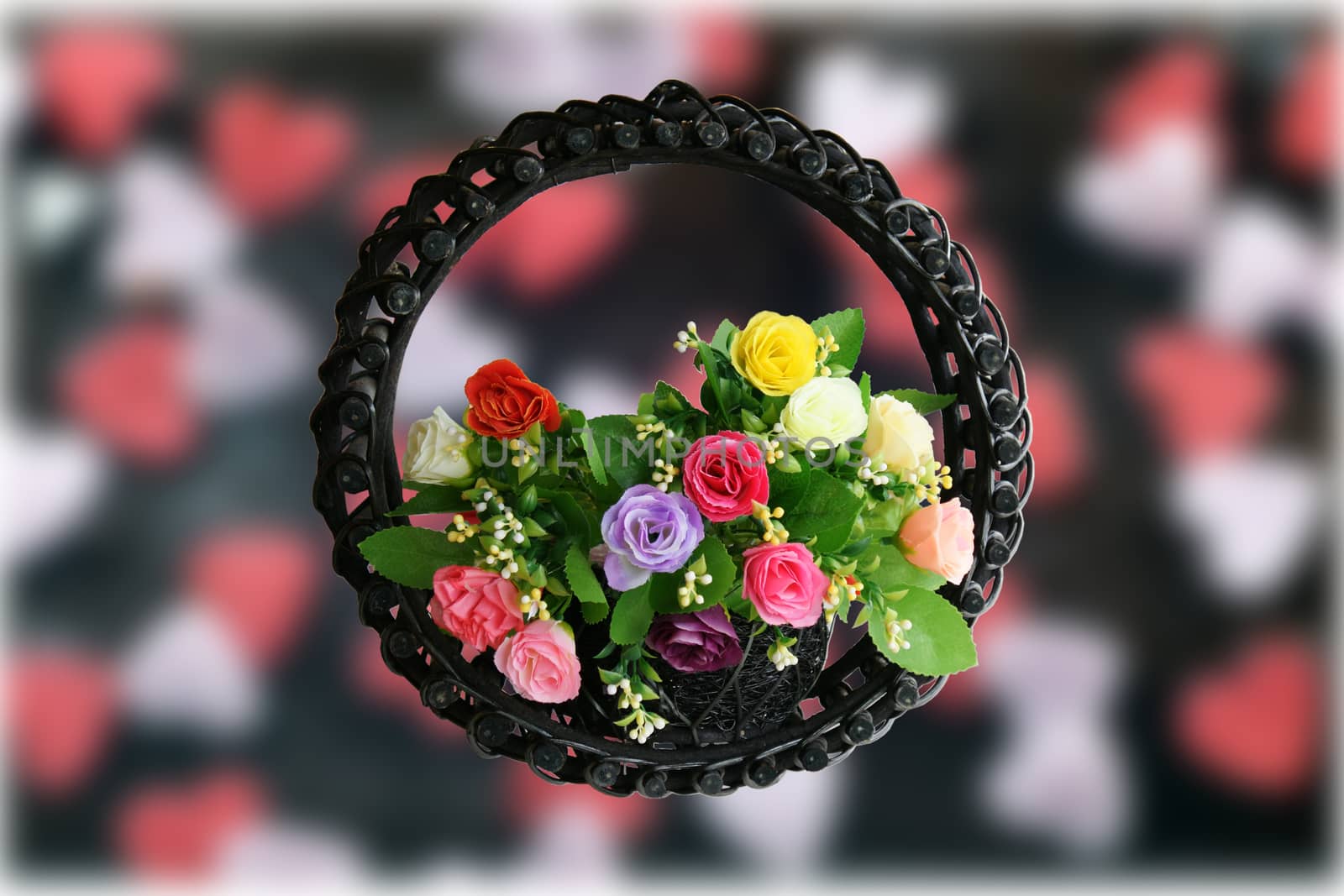 Rose basket on hearts background by mranucha