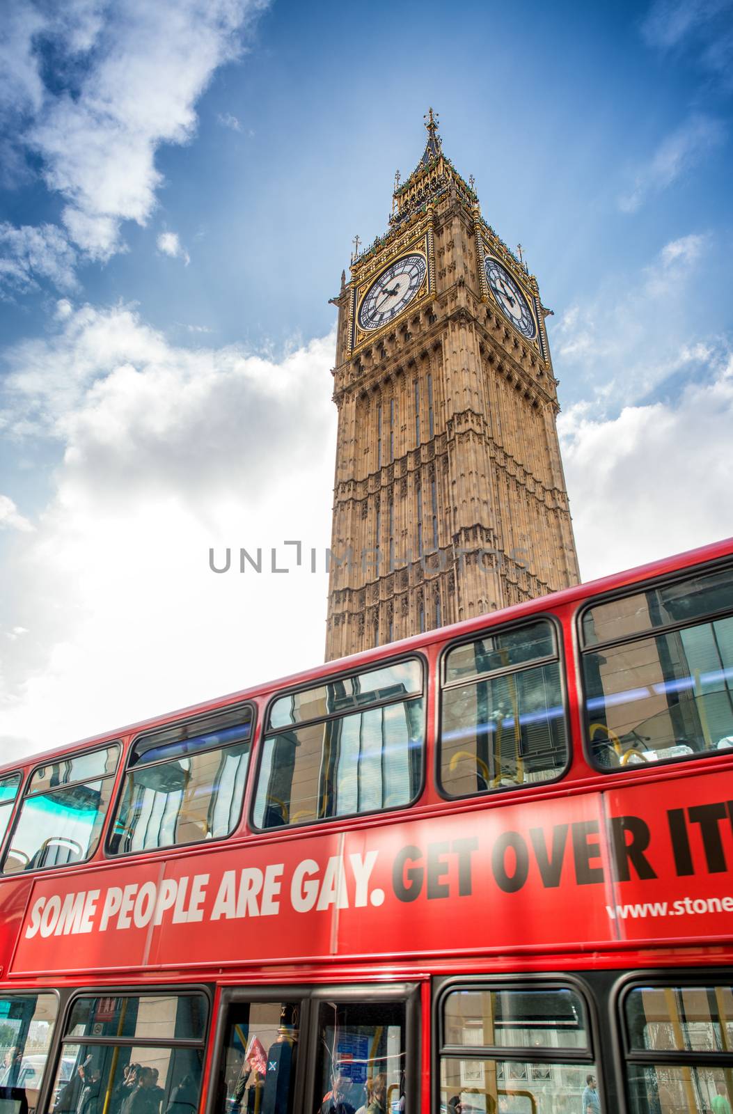 Red bus under Big Ben by jovannig