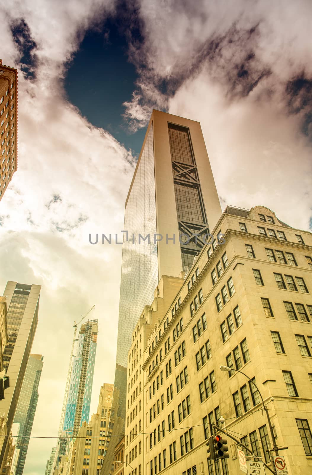 Street skyline of Lower Manhattan on a beautiful sunny day by jovannig