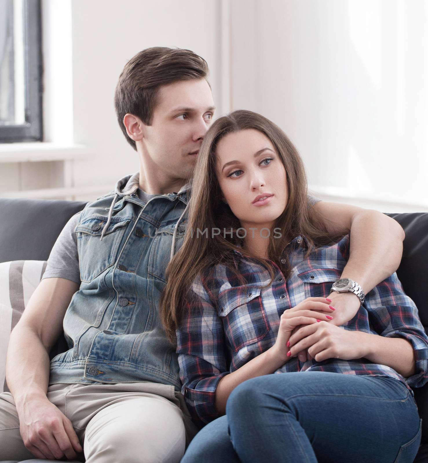 Love, relationship. Beautiful couple at home