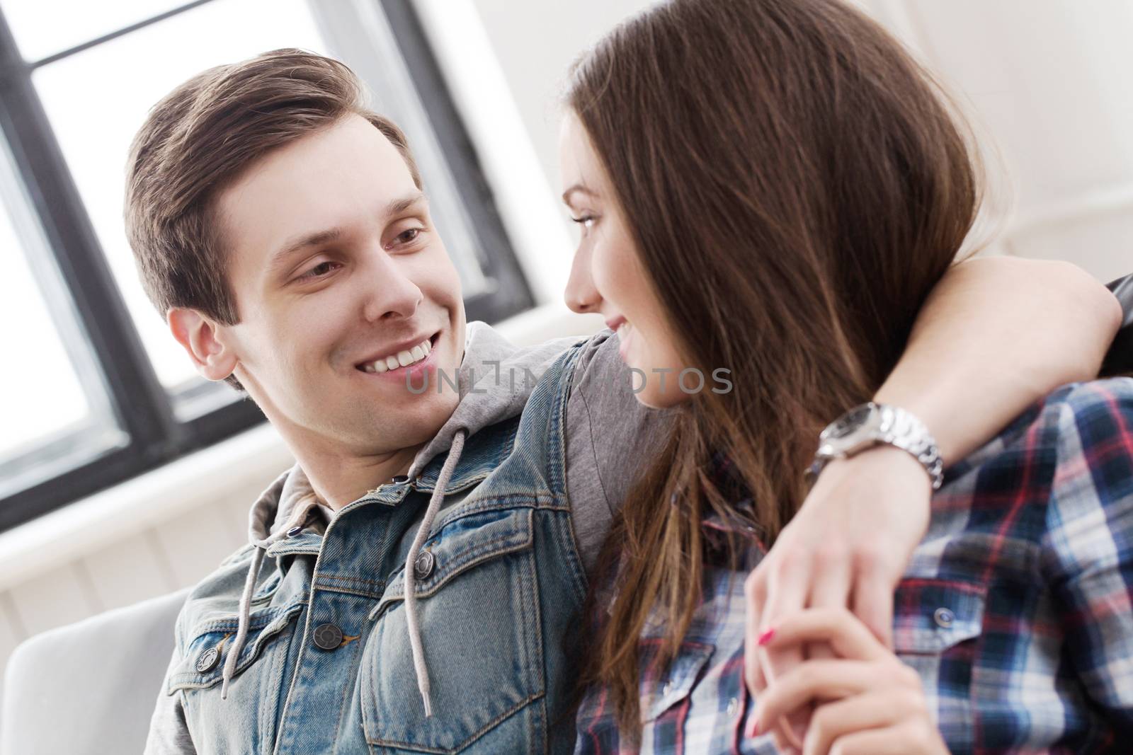 Love, relationship. Beautiful couple at home