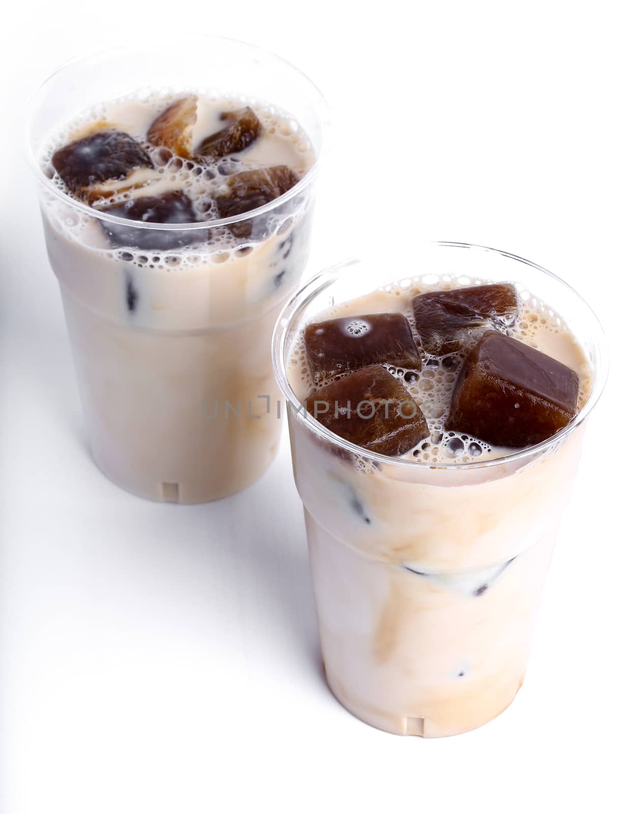 Delicious coffee with ice cubes