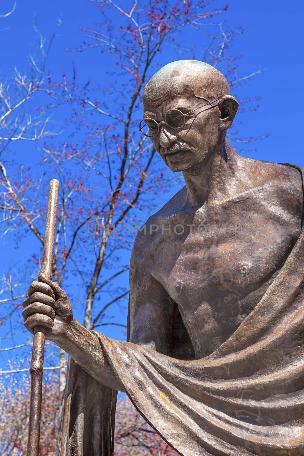 Mahatma Mohandas Gandhi Public Statue Front of Indian Embassy Embassy Row Massachusetts Ave Washington DC.  Gandhi is walking to sea on salt march.  Dedicated September 2000,  Artist Gautam Pal