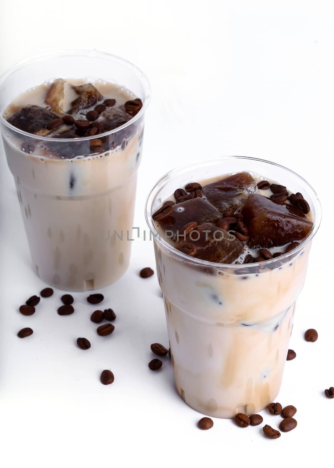 Delicious coffee with ice cubes