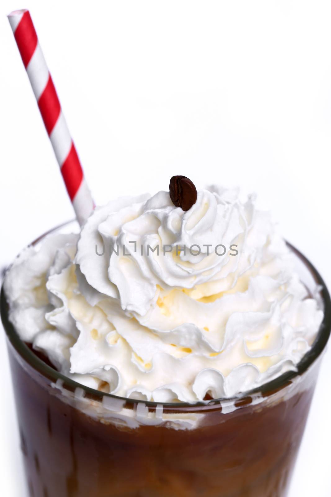 Glass of cold coffee on a white background