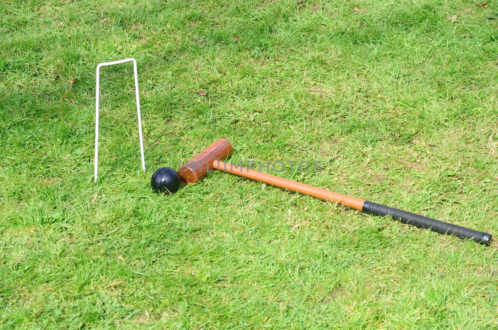 Croquet Hoop mallet and ball in landscape