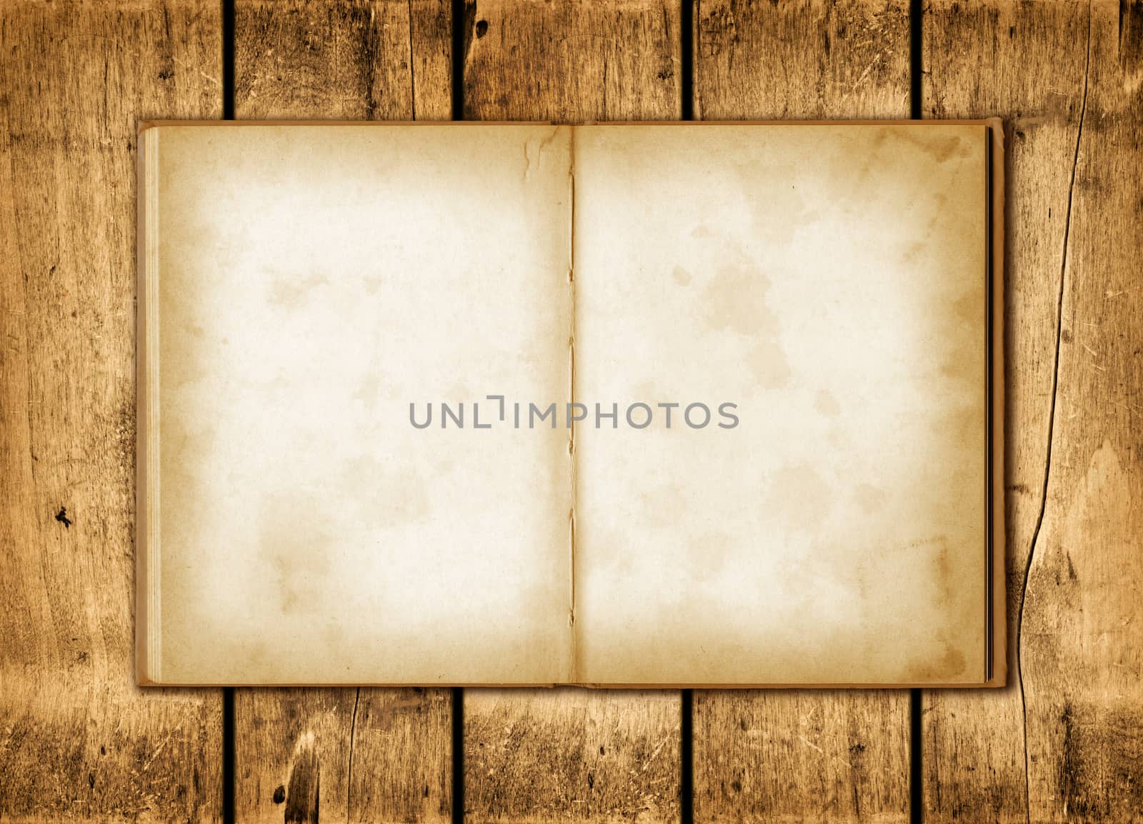 Note book on a wood background by daboost