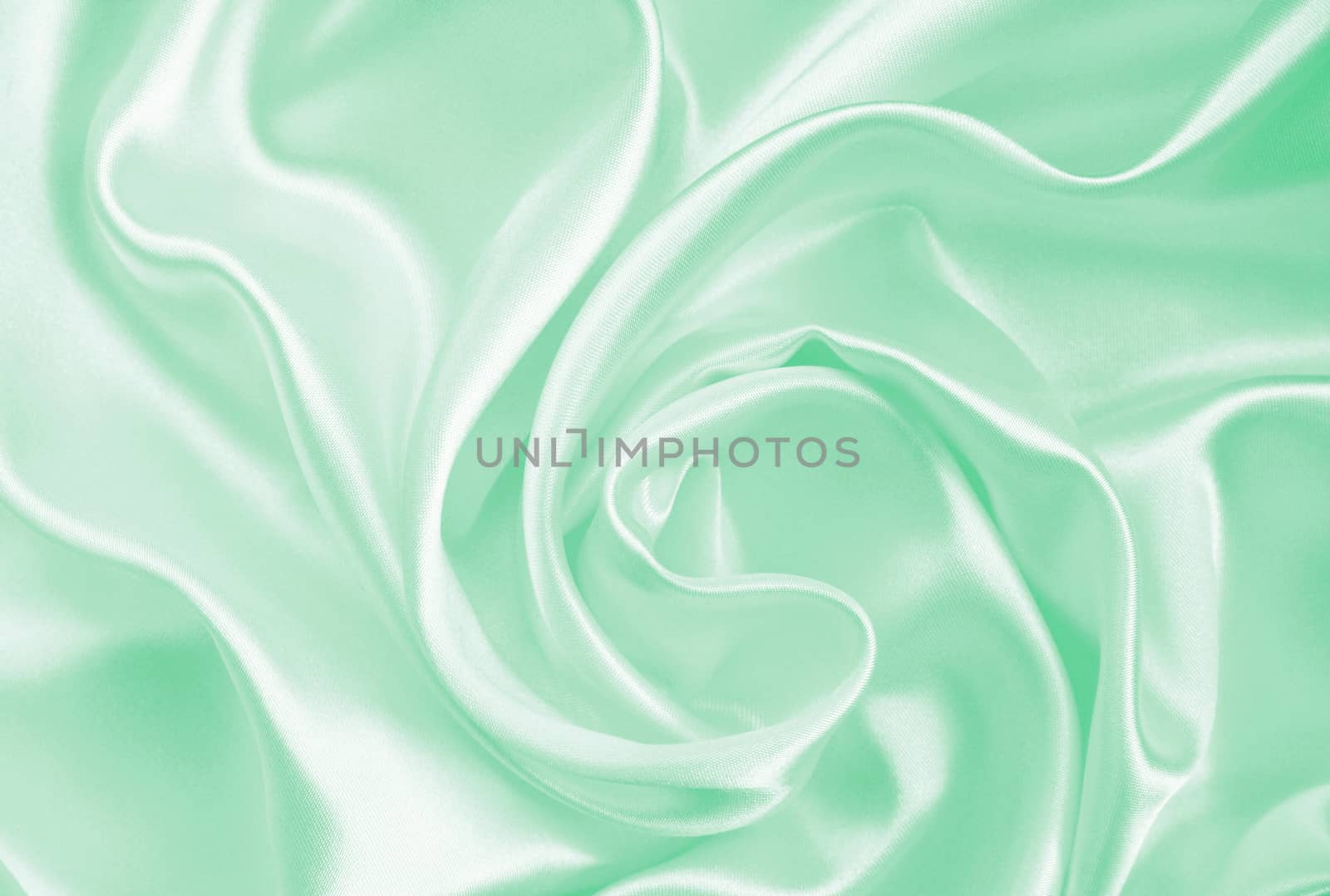 Smooth elegant green silk or satin can use as background 