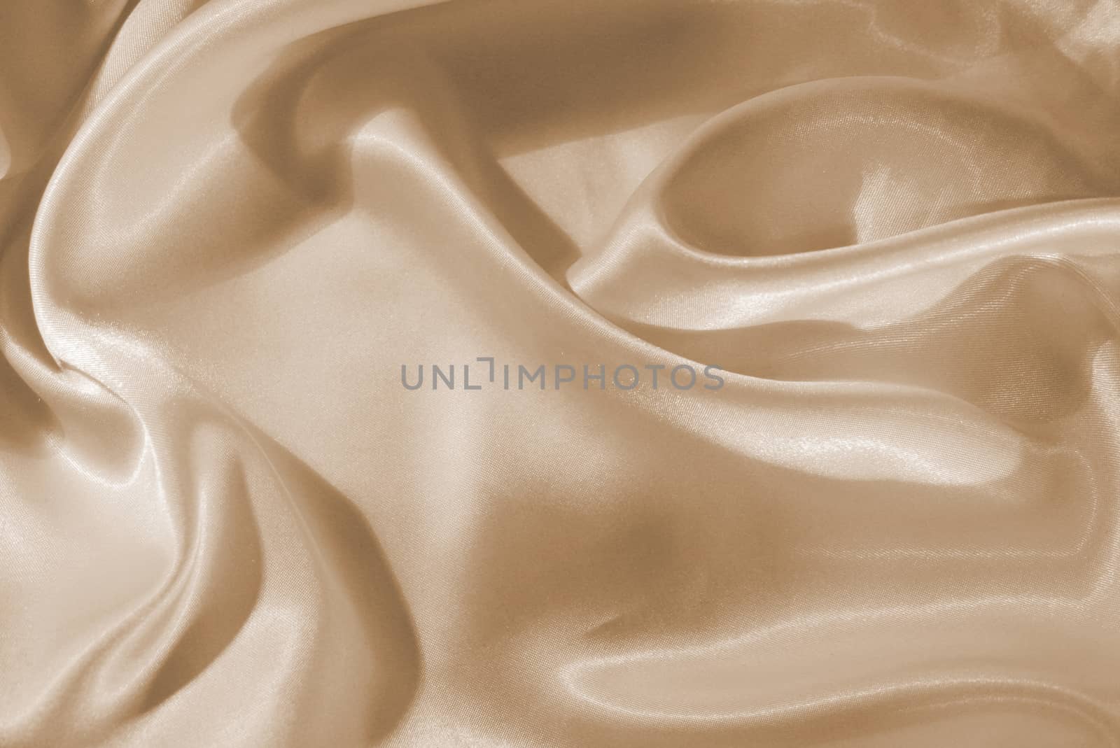 Smooth elegant golden silk as wedding background. In Sepia toned by oxanatravel