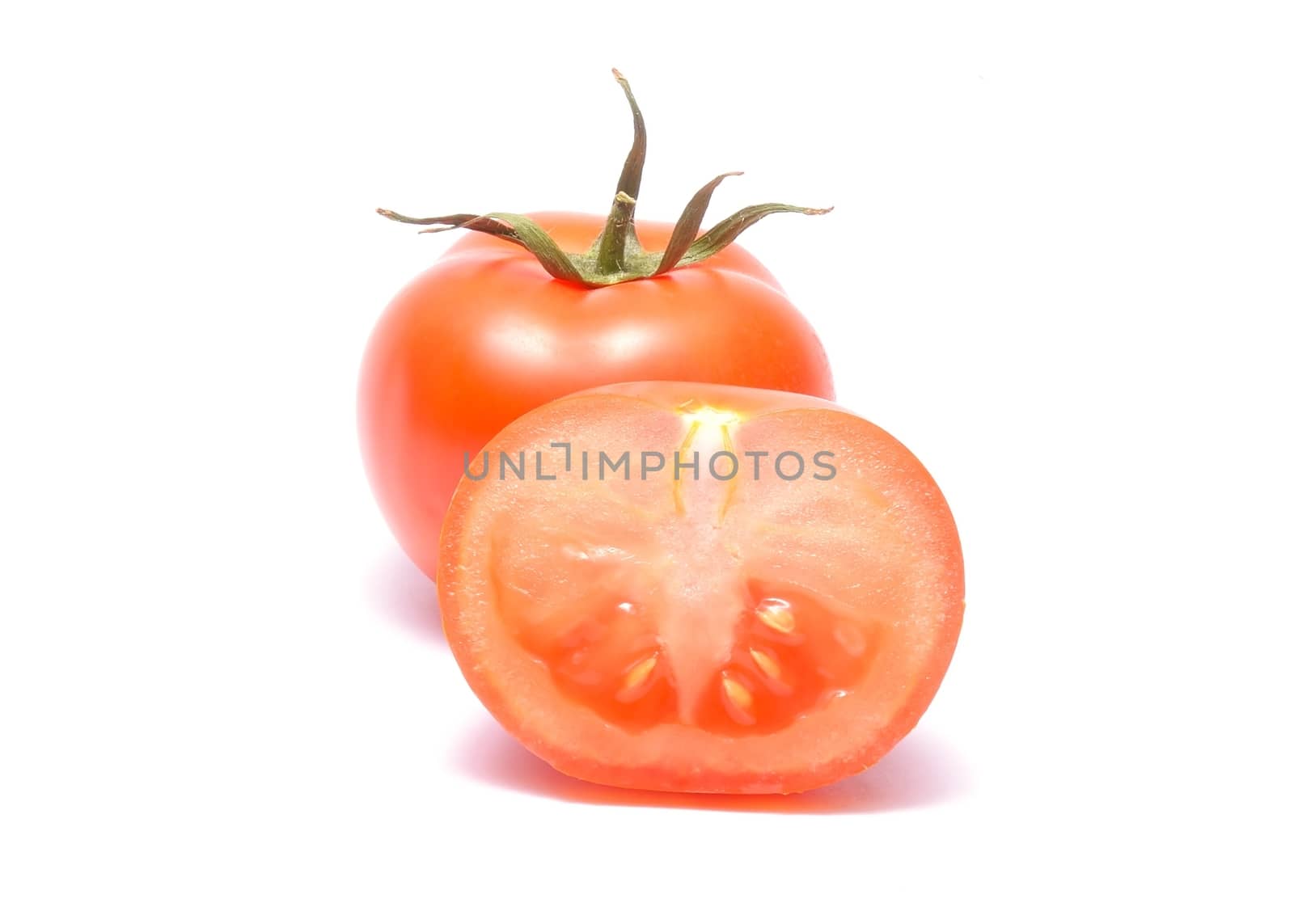 Red tomato with handle isolated on white background