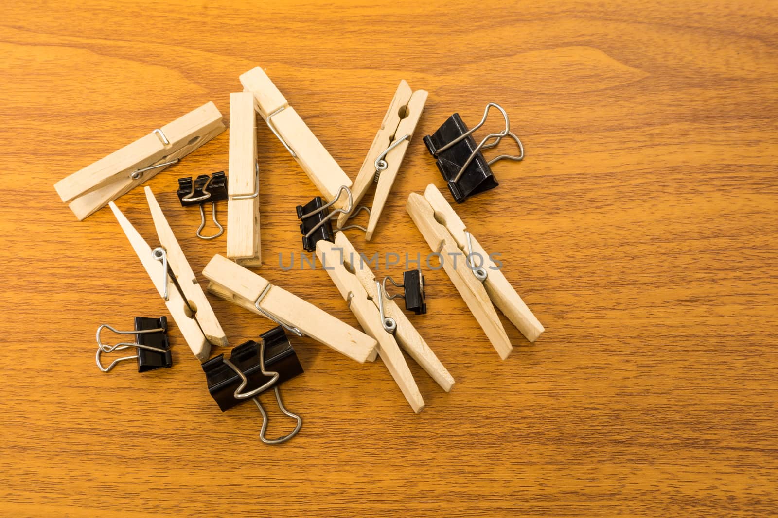Group of Black Clip and Wood Clothespins with Random Pattern