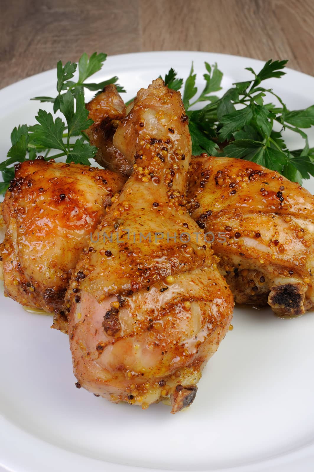 Baked chicken drumstick in Dijon mustard