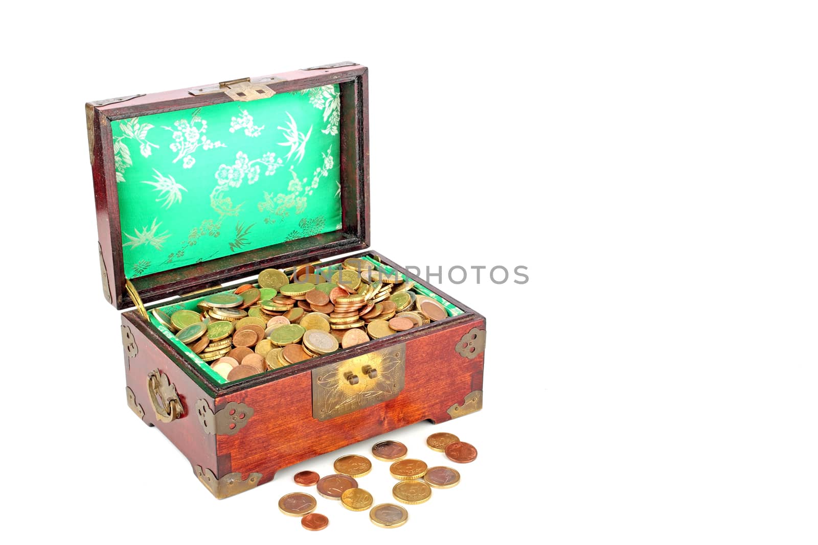 Ancient wooden chest full of euro coins