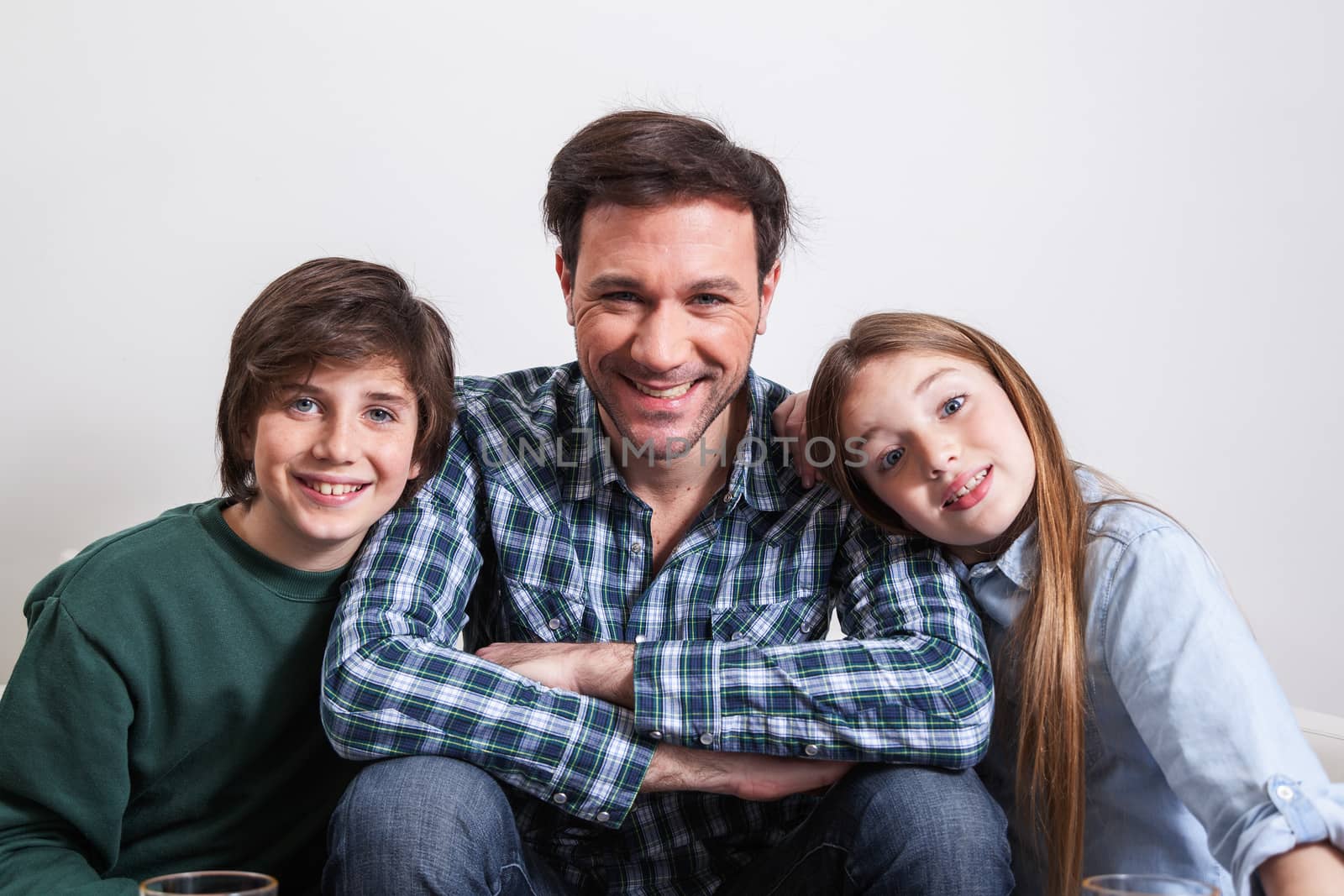 Man sitting with your two sons