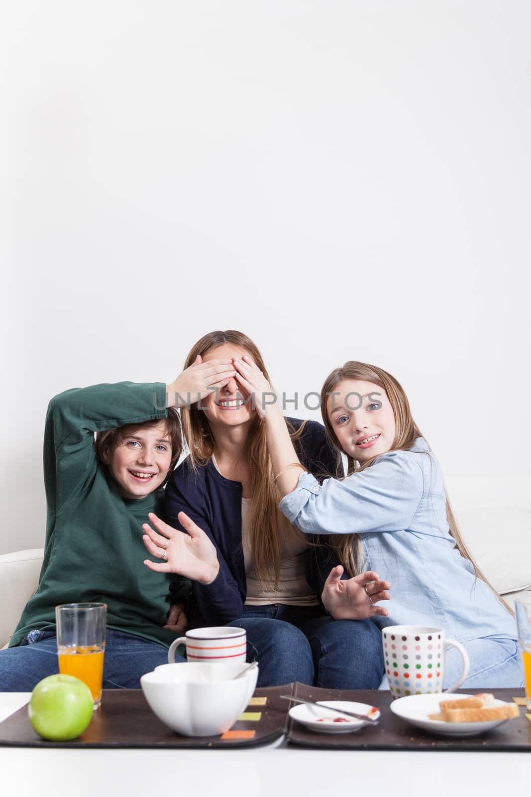 Sons giving a surprise to her mother