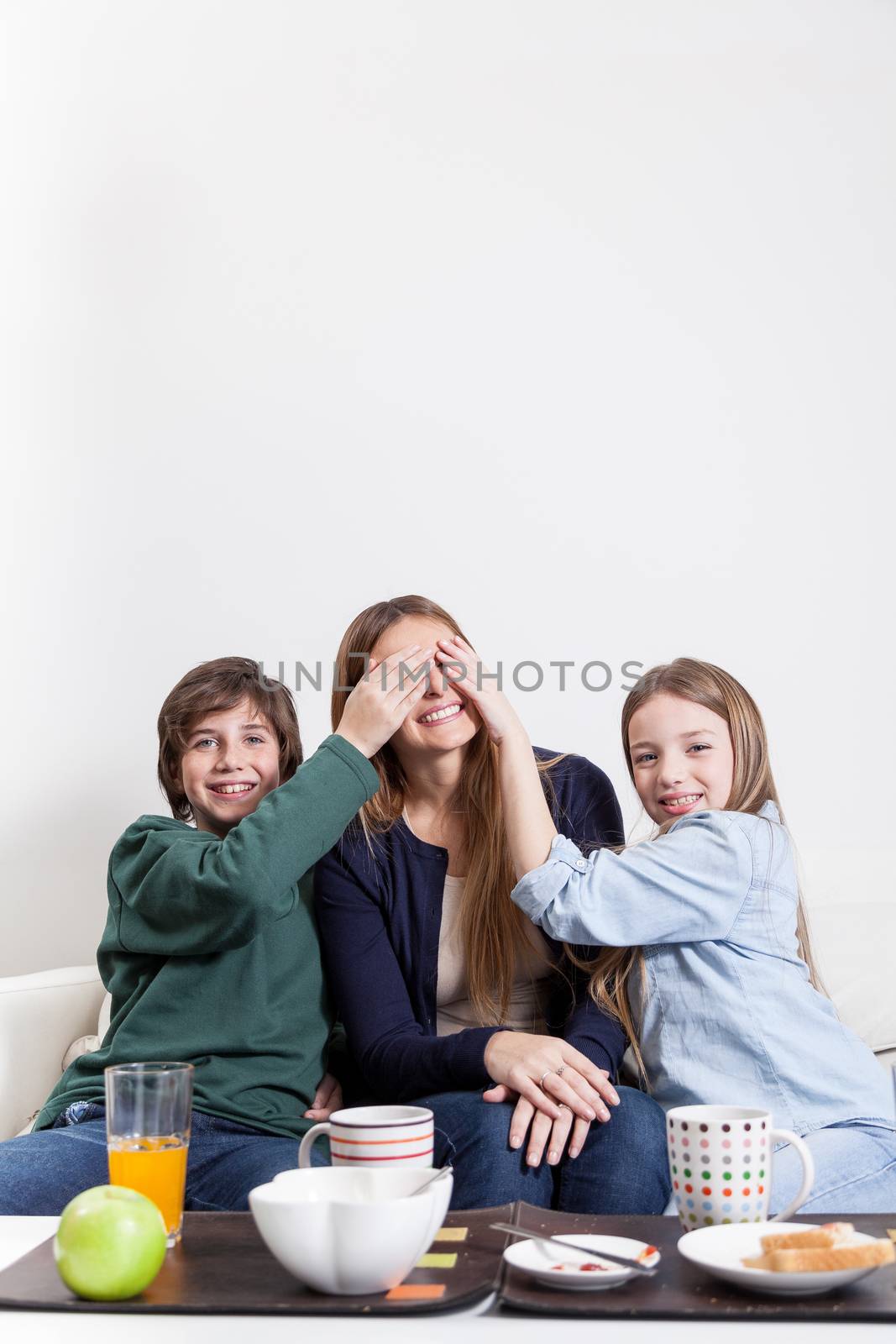 Happy family having the breakfast together