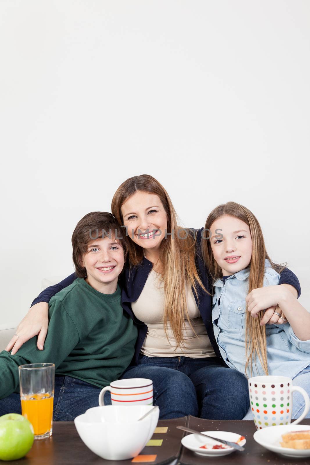 Happy family having the breakfast together