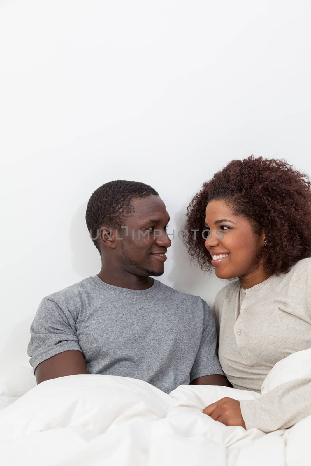 Black couple looking each other by ifilms