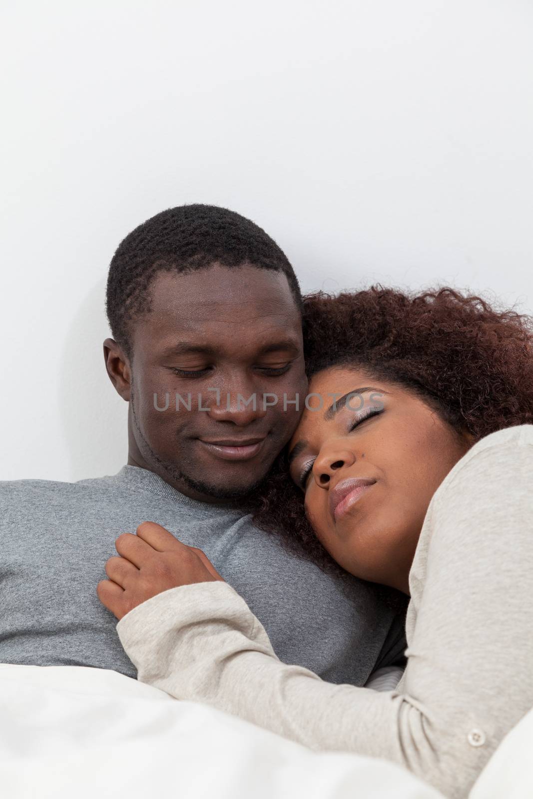 Black couple sleeping