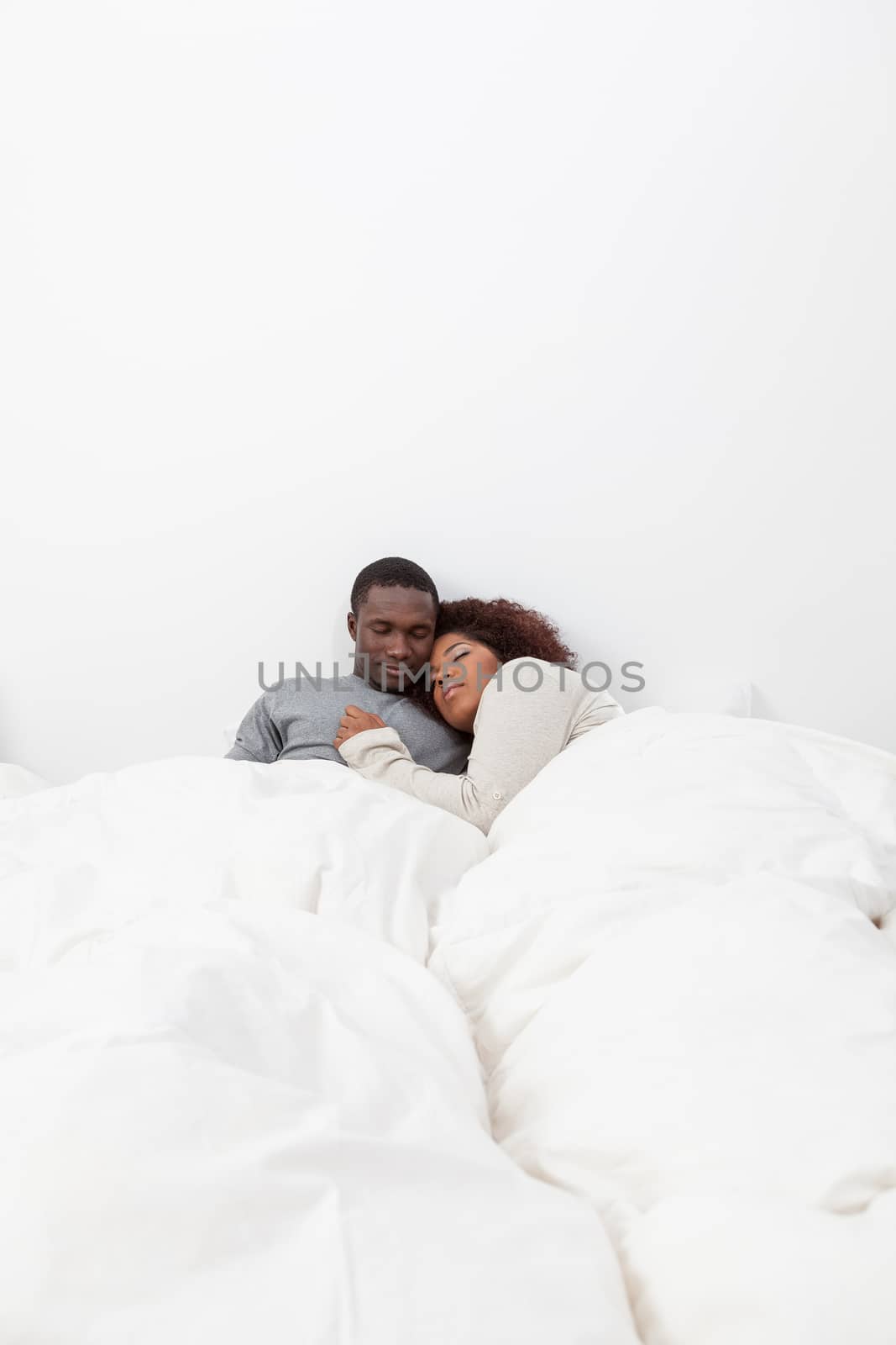Black couple in love in the bed by ifilms