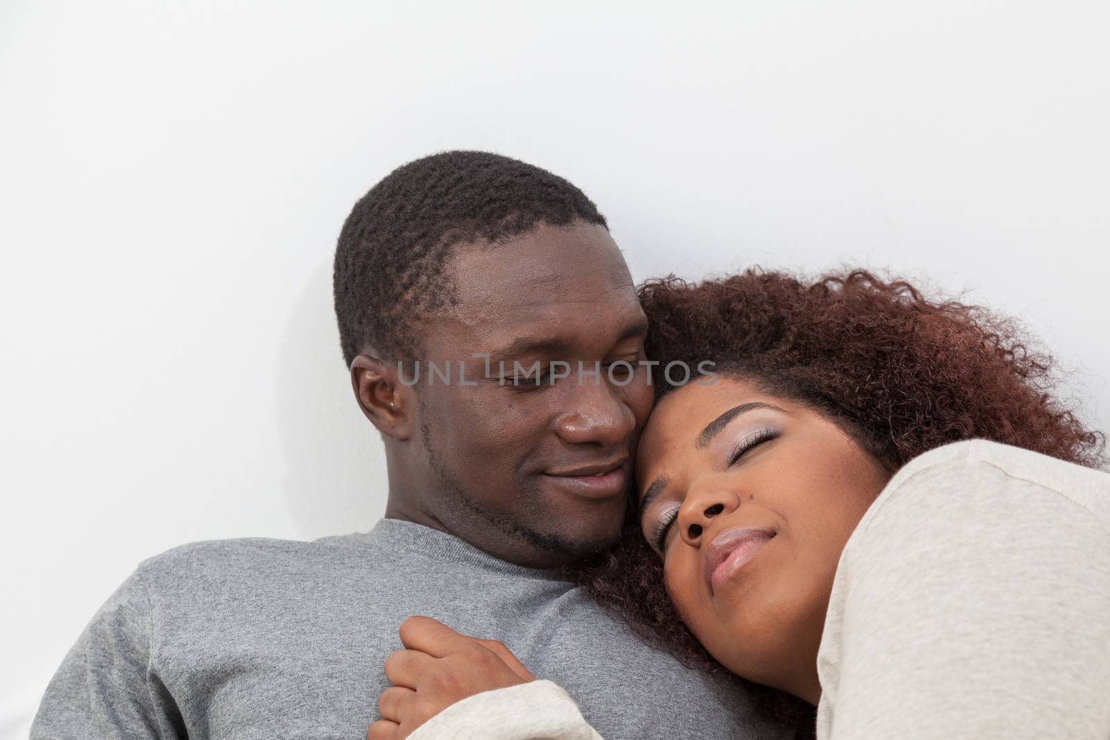 Black couple sleeping by ifilms