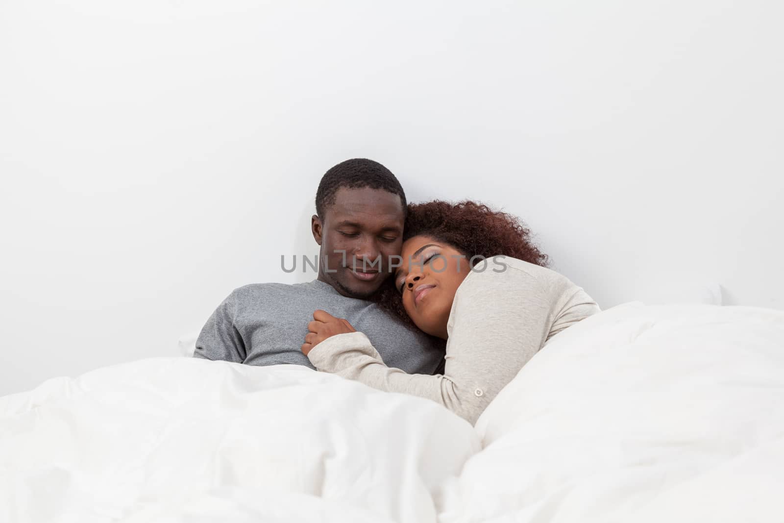 Black couple in love in the bed by ifilms