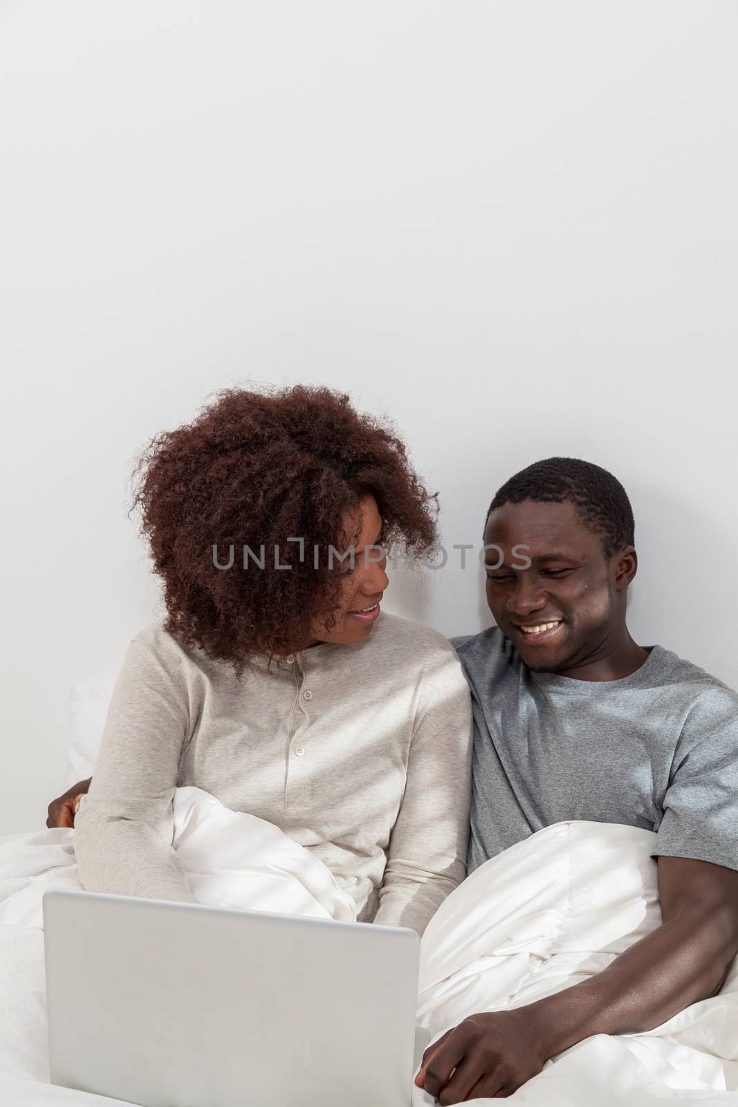 Black couple in love using the computer