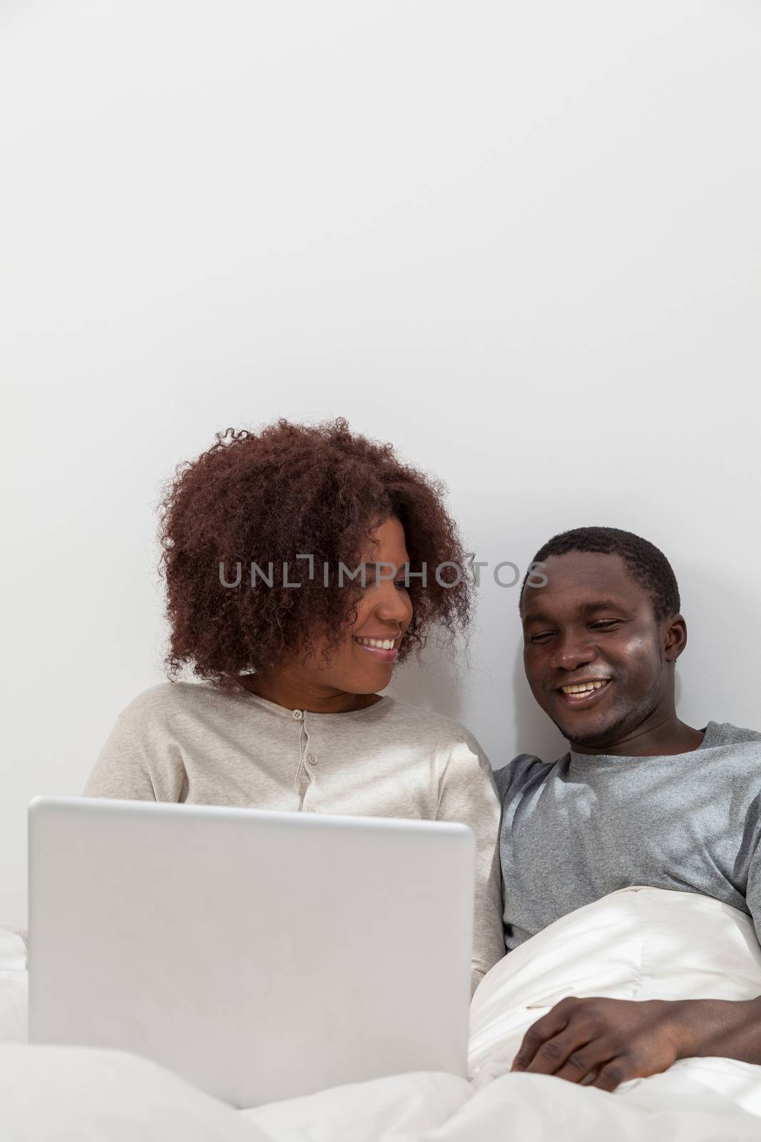 Black couple in love using the computer