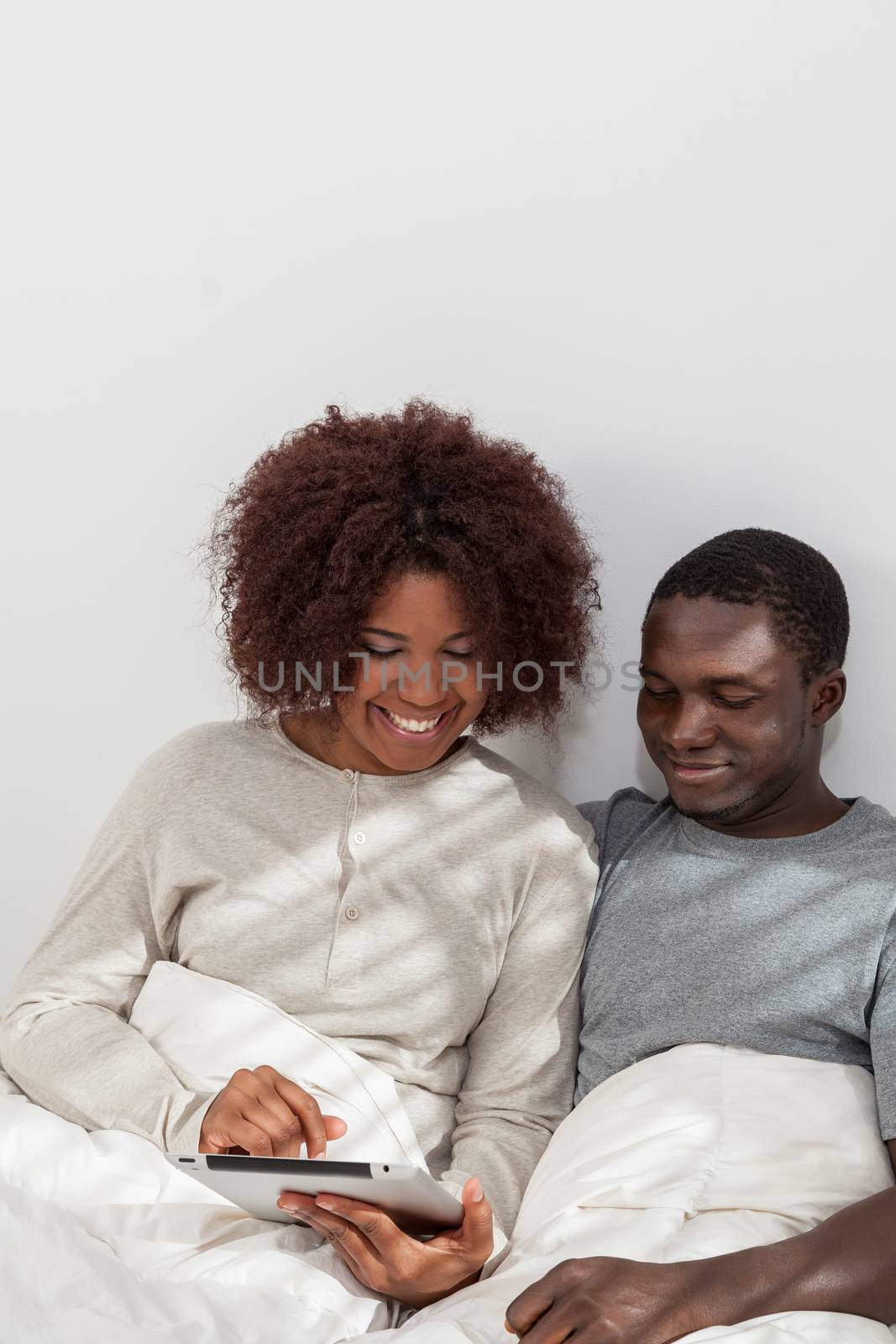 African couple using the computer