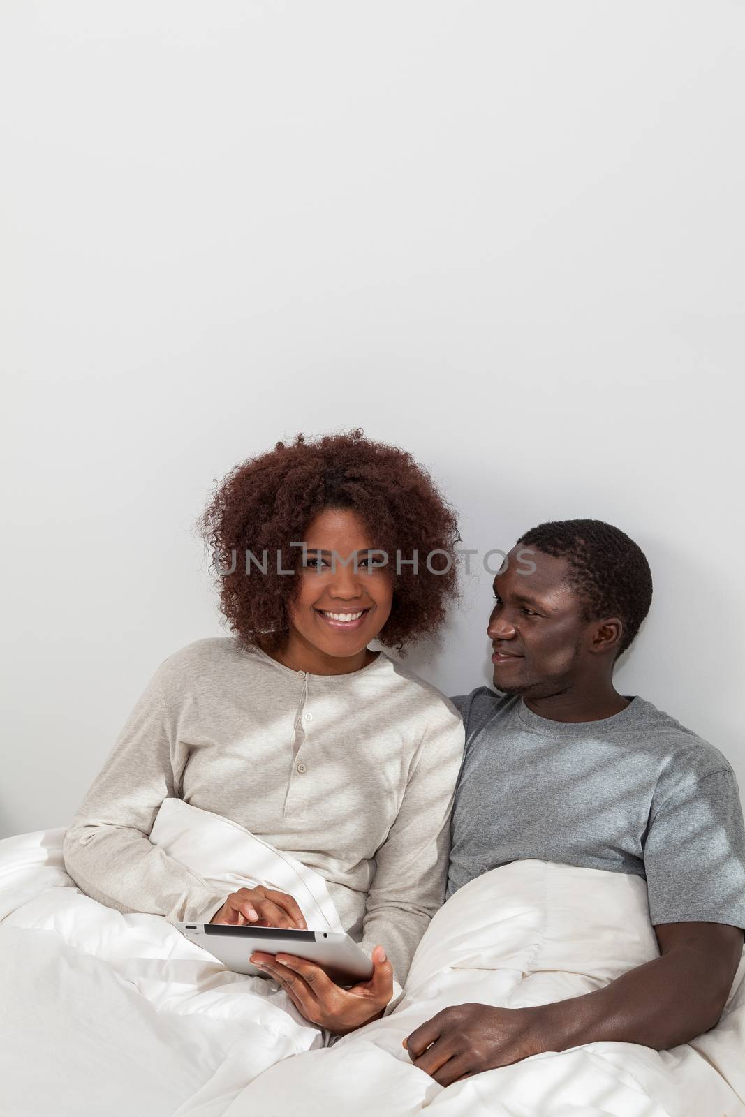 African couple using the computer