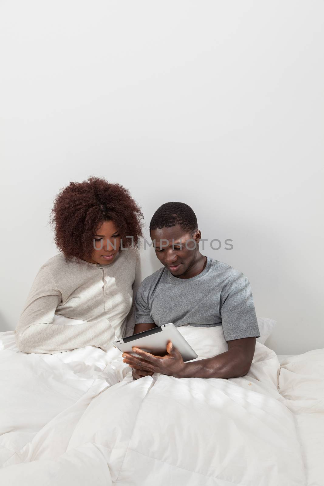 Black couple using the ipad