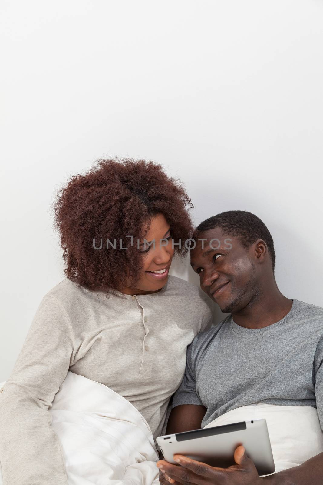 Black couple using the ipad