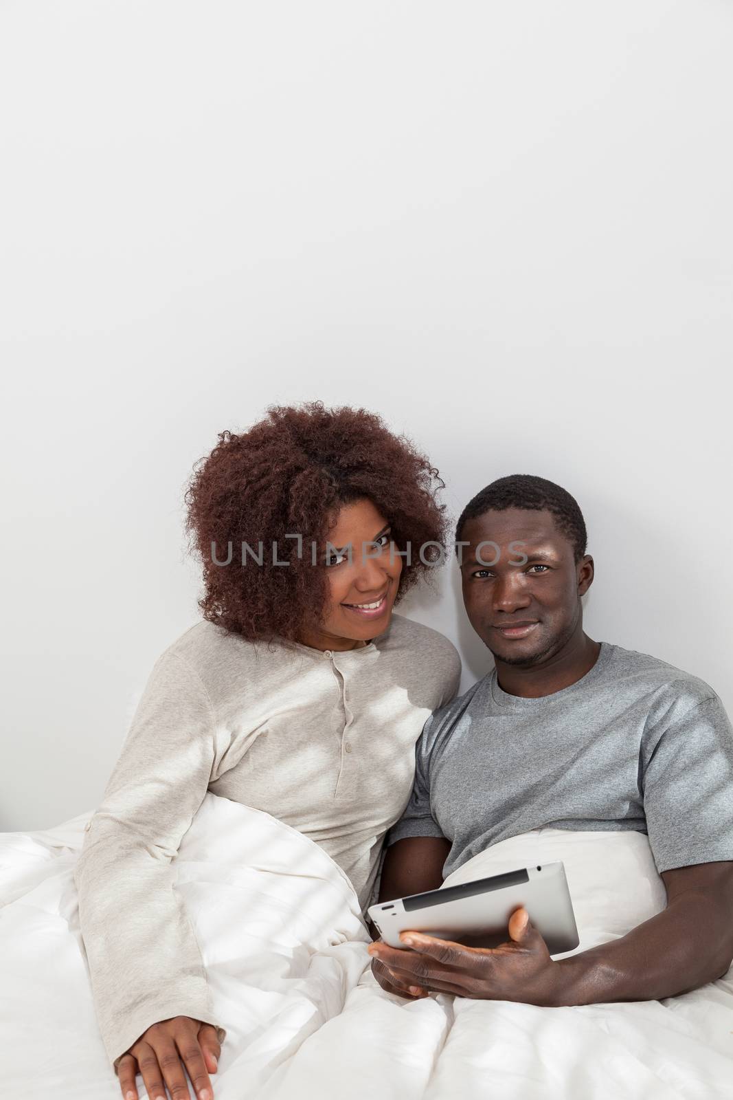 Black couple using the ipad