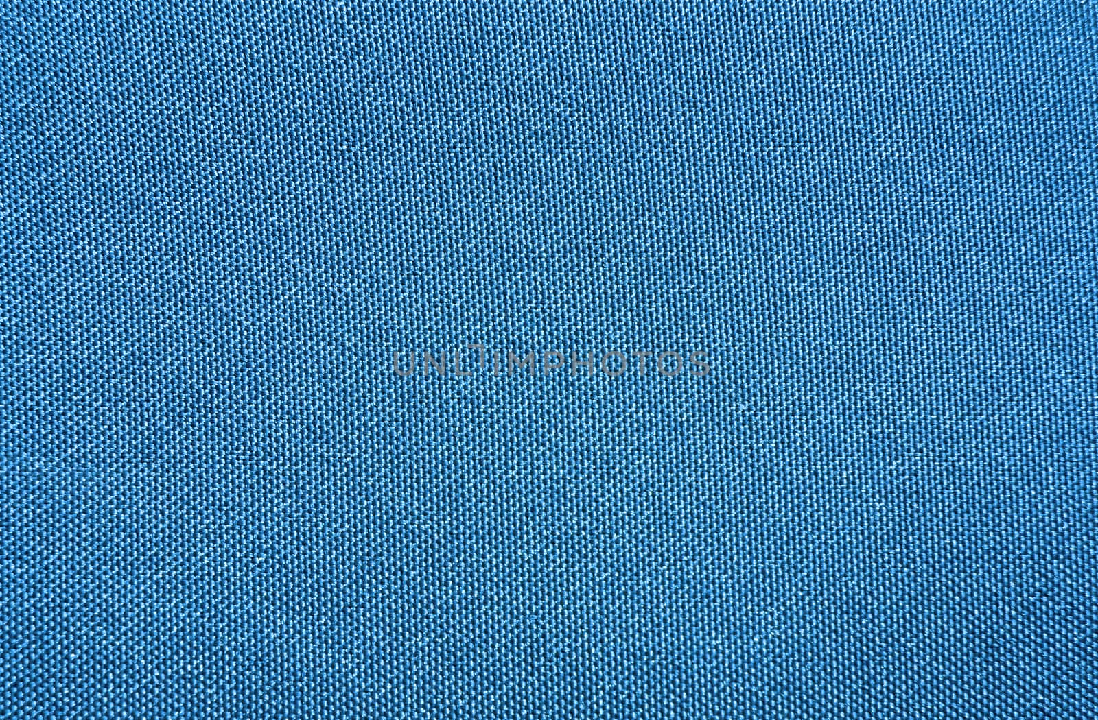 Texture of a blue woven synthetic waterproof fabric                               