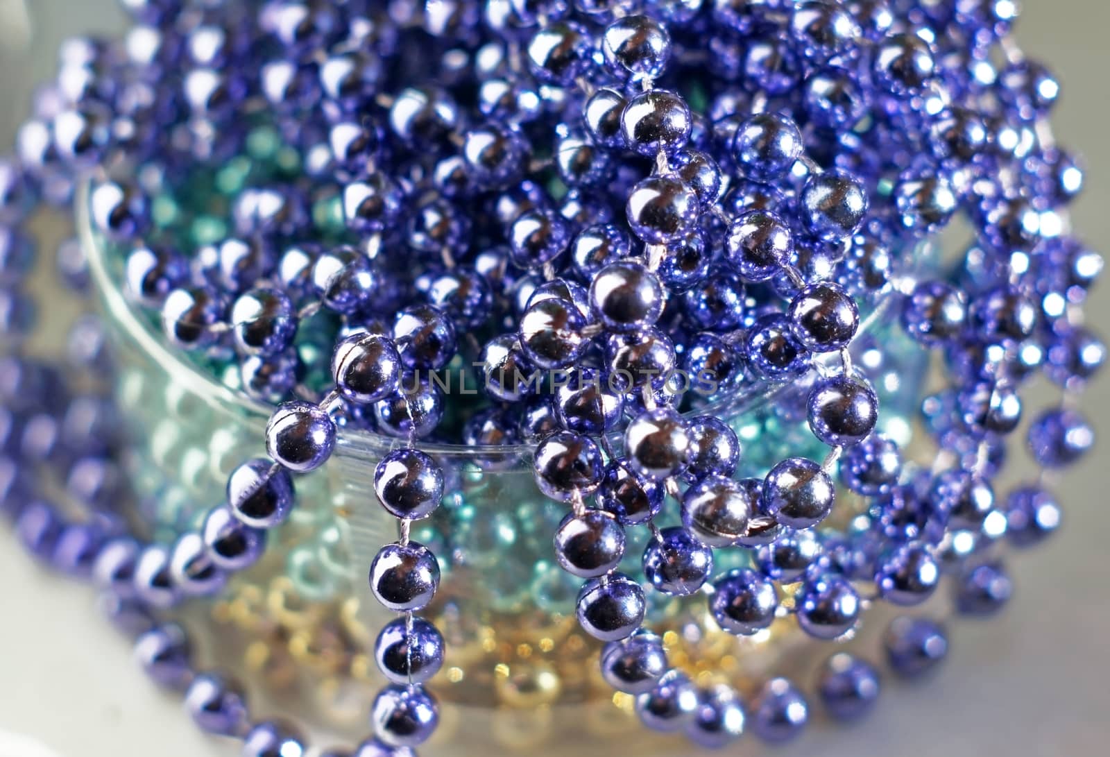 Lilac glass beads as abstract background                              