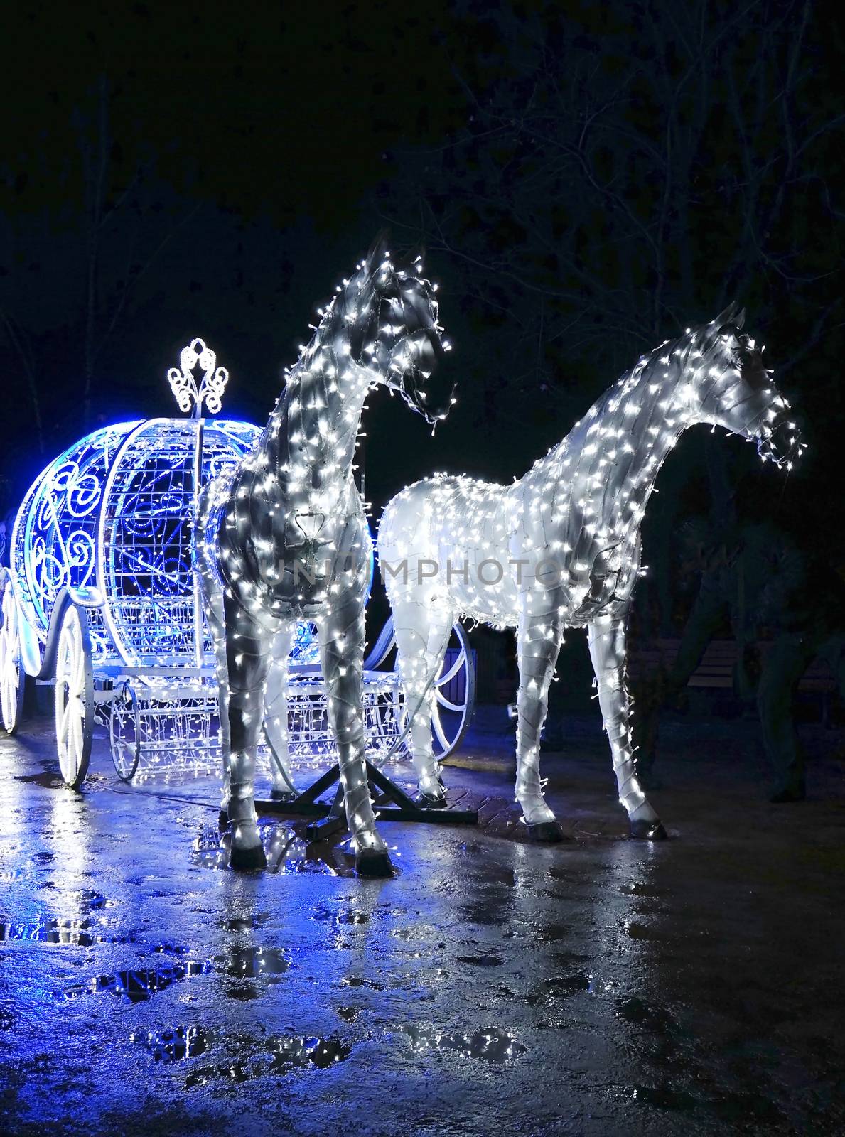 Decorative carriage with horses decorated with lights            by Chiffanna