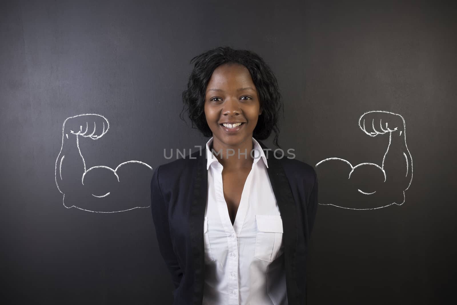 South African or African American woman teacher with healthy strong chalk arm muscles for success on blackboard background
