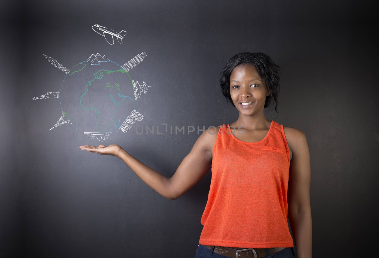 South African or African American woman teacher or student with chalk globe and jet world travel by alistaircotton