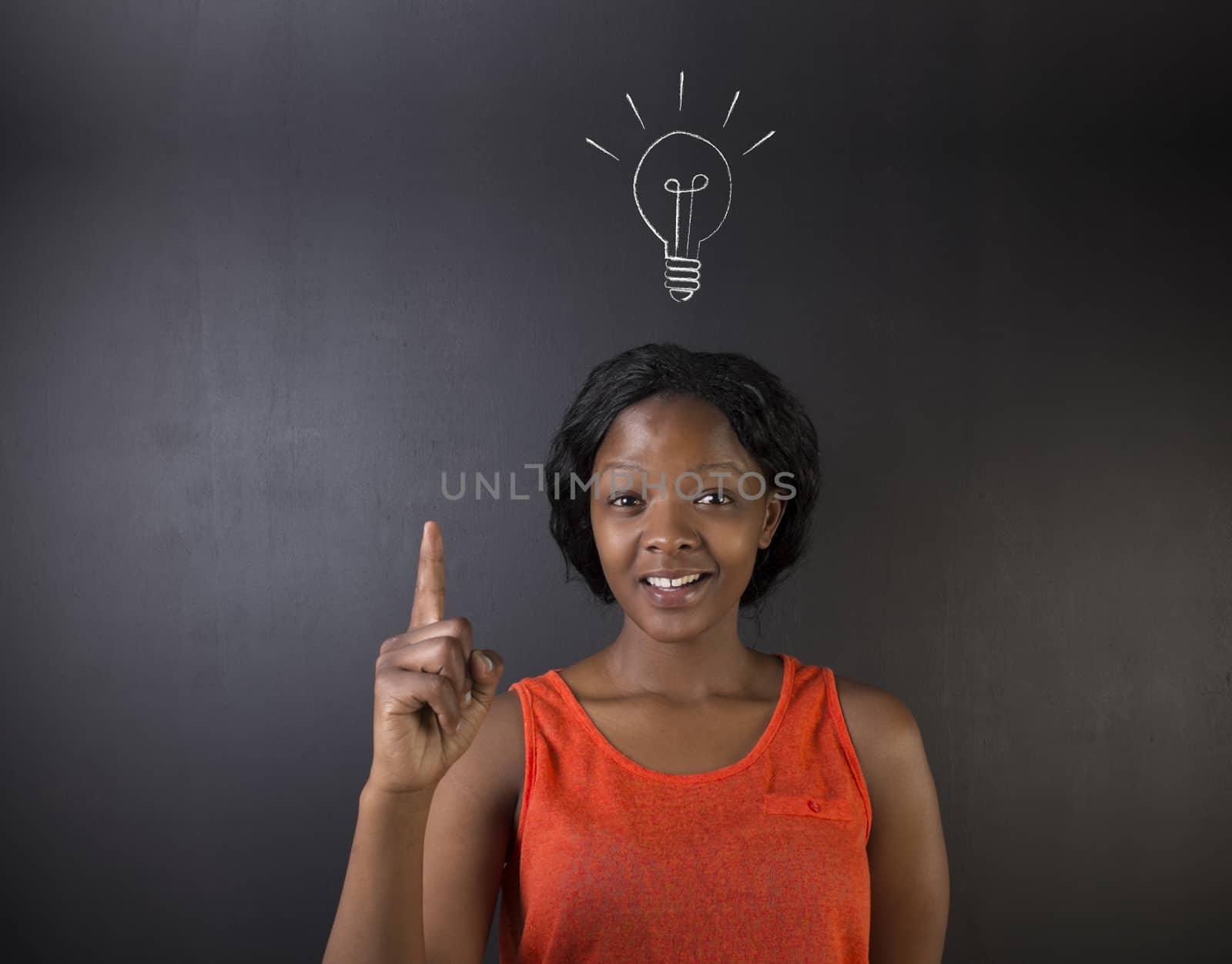 Bright idea lightbulb thinking South African or African American woman teacher or student by alistaircotton