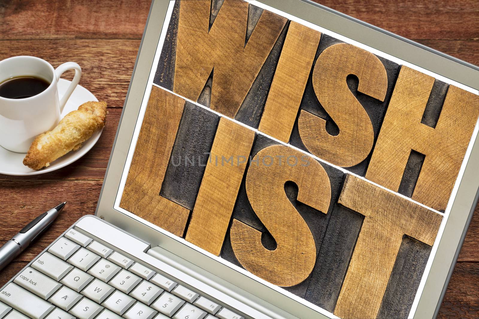 wish list word abstract on laptop by PixelsAway